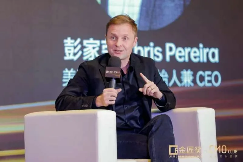 Chris Pereira smiling during a fireside chat at the Jinjiang Awards CMO Club