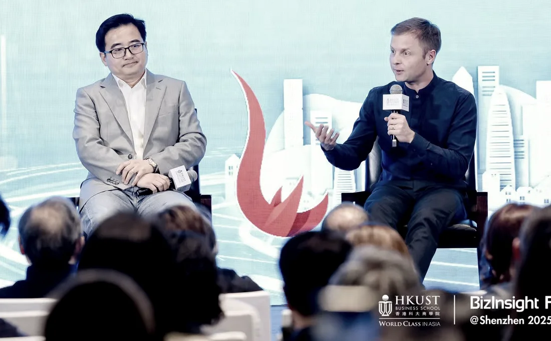 Chris Pereira speaking on a panel with BYD's Li Yunfei at the HKUST BizInsight Forum in Shenzhen