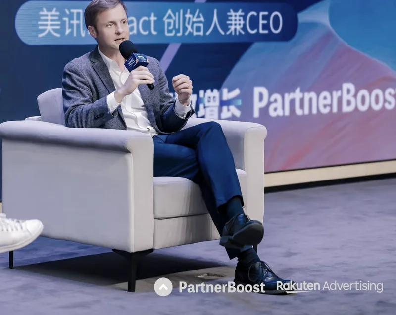 Chris Pereira in conversation on stage at a PartnerBoost and Rakuten Advertising event